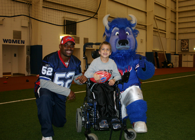 FootballClinicForDisabled Football Clinic for the Disabled, November 23rd - Draft was able to attend the final night of the Flag Football Clinic for the disabled in the Buffalo Bills Fieldhouse. There was an awards presentations for all of the participants, and Draft was able to meet and play flag football with the athletes.